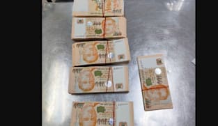 சிங்கப்பூருக்குள் $20,000க்குமேல் கொண்டுவந்த 4 பேர் பிடிபட்டனர்