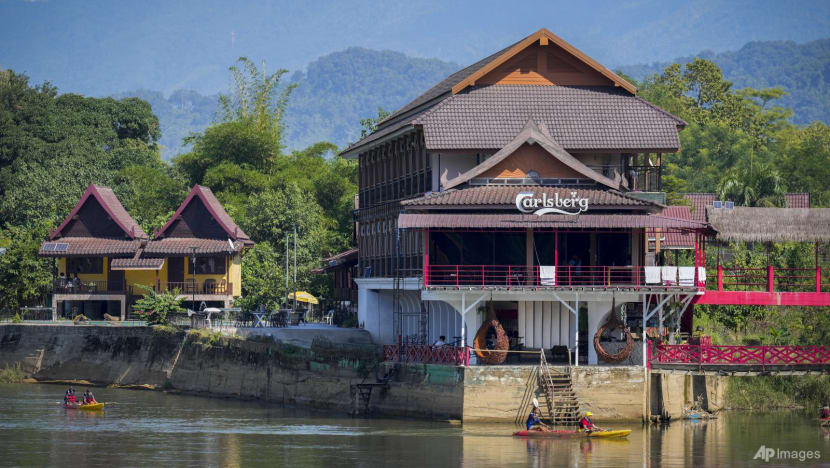 Laos bans vodka and whisky brand following deaths from suspected methanol poisoning Laos bans vodka and whisky brand following deaths from suspected methanol poisoning