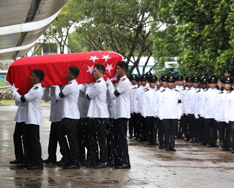 In pouring rain, friends and family bid farewell to NSF firefighter at ceremonial funeral