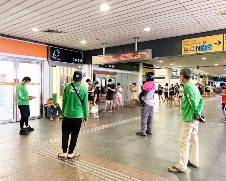 Queues form at bubble tea shops hours before they shut to comply with tighter controls to curb Covid-19