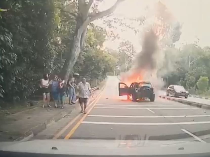 Video footage of the accident, which took place along Eng Neo Avenue on Saturday (Dec 28), has been making the rounds on social media and show the car gradually catching fire as its passengers are evacuated to the side of the road.