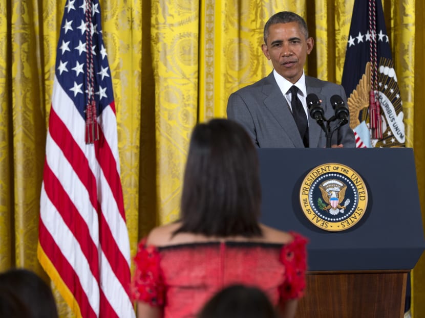President Barack Obama listens to a question during an event with Young South-east Asian Leaders Initiative fellows, Monday, June 1, 2015, in the East Room of the White House in Washington. Photo: AP
