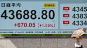 Asian markets mixed after US Fed rate cut
