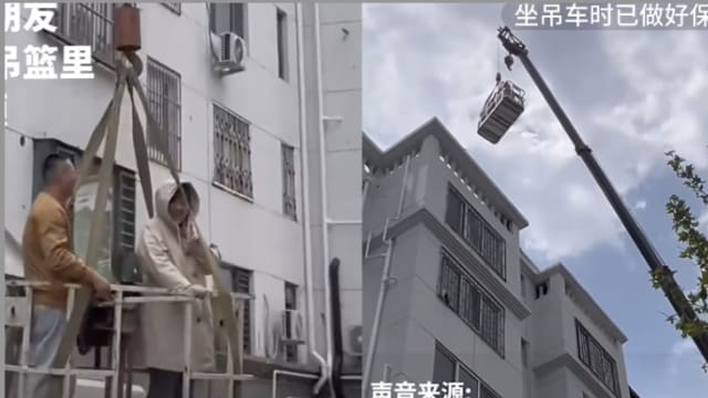 中国女剖腹产住家没电梯 家人叫吊车“载”她回家
