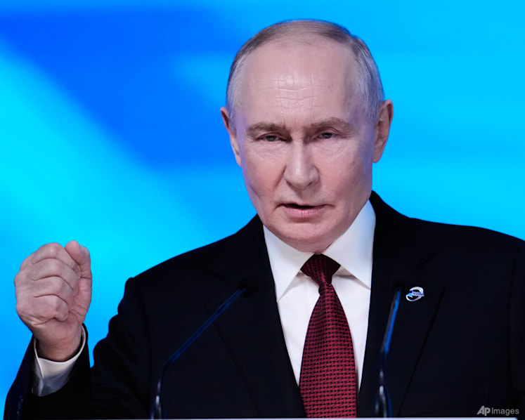 Putin says all weapons 'on agenda' if Russia's Kaliningrad attacked