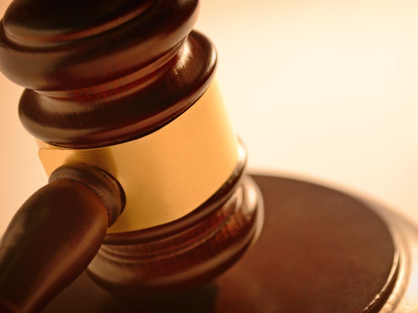 Aida Tay Ai Ling engaged a printing shop to produce 10 fake MC booklets from Town Clinic, a clinic she used to visit.