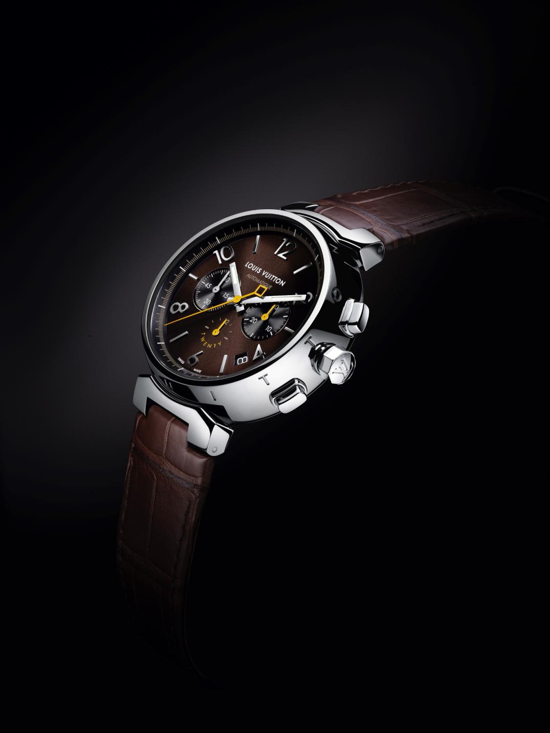 This limited edition Louis Vuitton Tambour watch comes in a special monogram trunk CNA Luxury