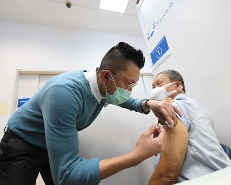 Covid-19 vaccination exercise for taxi, private-hire drivers kicks off, over 50,000 drivers to get jab: LTA