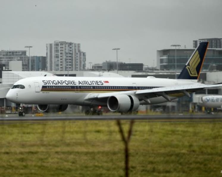 Two travellers from South Africa who transited in Singapore test positive for Omicron COVID-19 variant in Sydney
