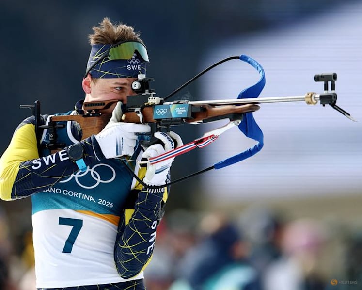 Biathlon-Sweden's Ponsiluoma shows nerves of steel to win men's 12.5km pursuit gold