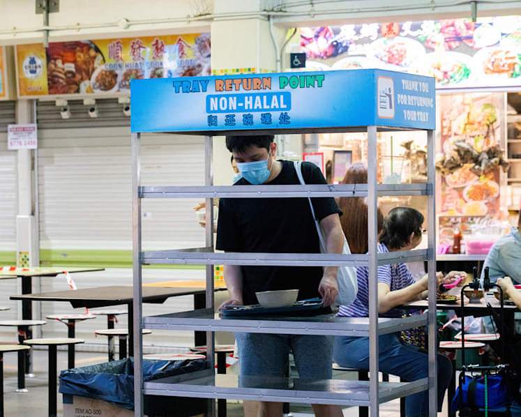 More hawker centre diners returning trays as NEA advisory period kicks in ahead of fines, warnings