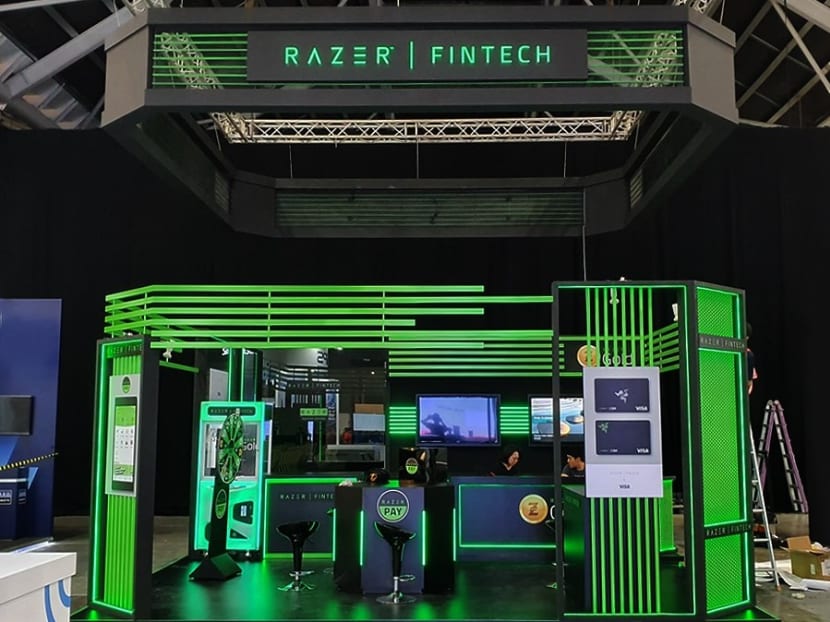 The Razer Fintech booth at the Singapore Fintech Festival in November 2019. The gaming company is building on its fintech business and collaborating with various service providers to get a digital banking licence. The Razer Fintech booth at the Singapore Fintech Festival in November 2019. The gaming company is building on its fintech business and collaborating with various service providers to get a digital banking licence.