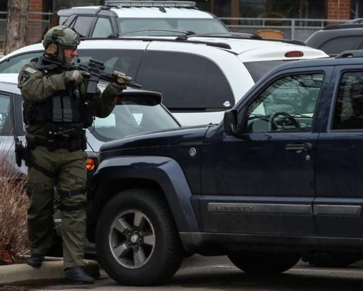 Gunman kills 10 people at Colorado supermarket, including police officer