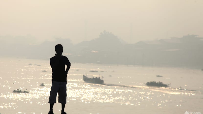 Indonesia escalates battle against fires, putrid haze