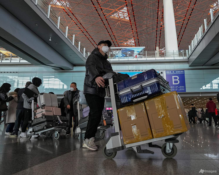 China may take until mid-2023 to get to business as usual after relaxing border curbs