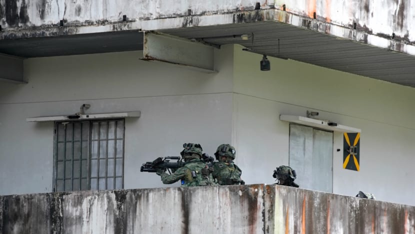 In the sweltering heat, Singapore and US soldiers train and build camaraderie
