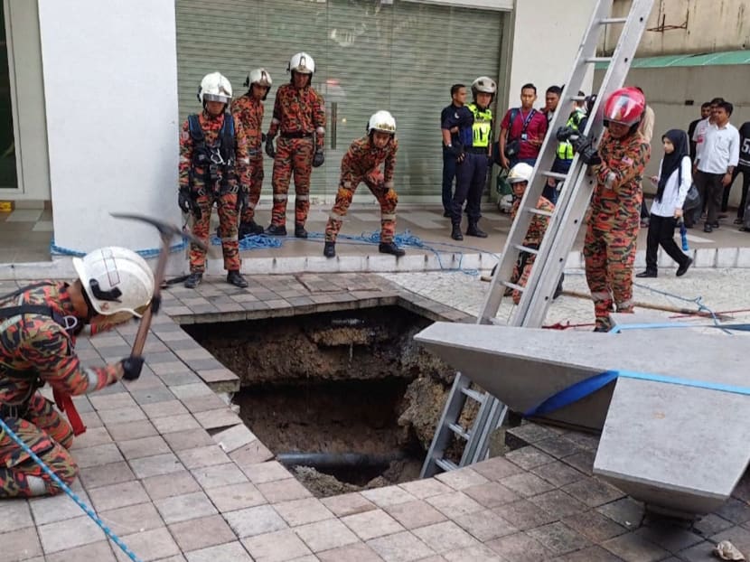 A 48-year-old Indian tourist remains unaccounted for, after falling into a sinkhole in Kuala Lumpur on Aug 23, 2024, according to the Malaysian police. A 48-year-old Indian tourist remains unaccounted for, after falling into a sinkhole in Kuala Lumpur on Aug 23, 2024, according to the Malaysian police.