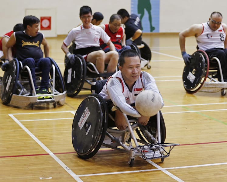 Singapore wheelchair rugby athletes at home in rough sport