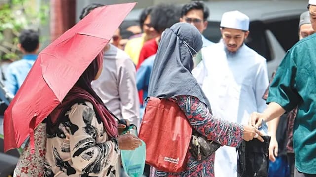 马国现新型乞讨潮 妇女携幼童街头强势讨钱