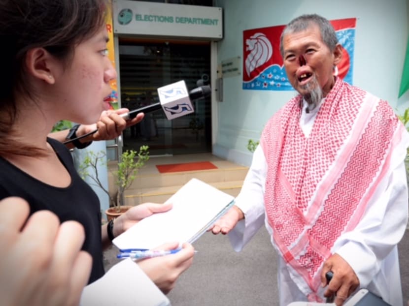 Potential candidates arrive at the Elections Department