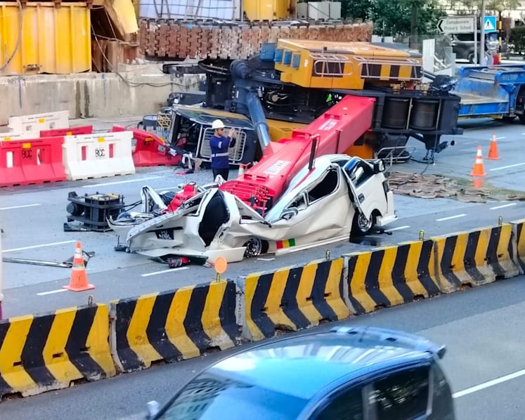Crane at PUB worksite topples and crushes van in Sengkang; driver taken to hospital