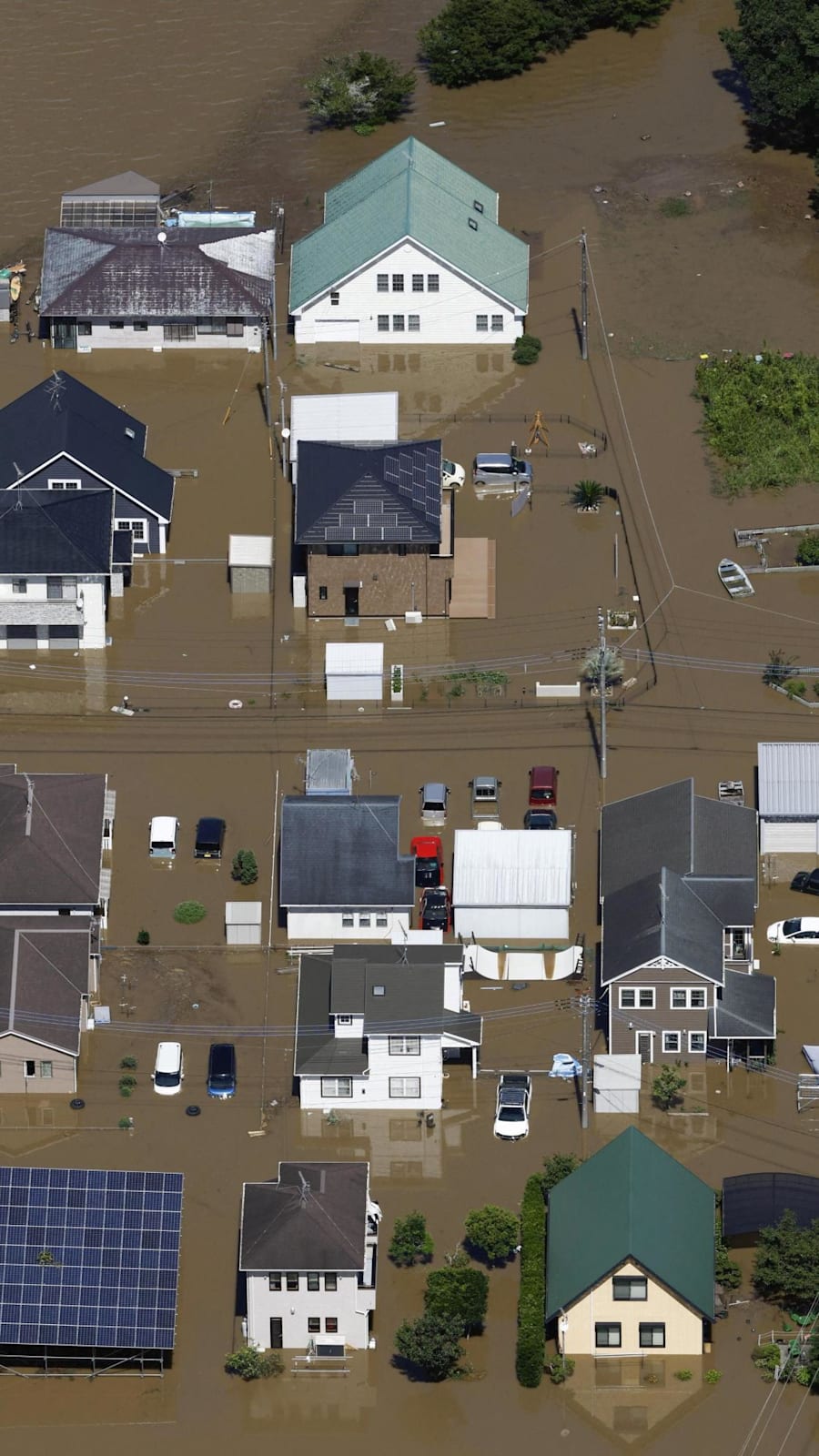 Record rain in Japan kills at least 8, leaves thousands stranded at Narita airport