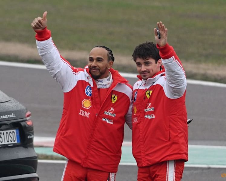 Hamilton speaks of 'massive challenge' as new Ferrari breaks cover