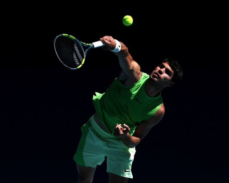 Alcaraz turns showman in Moutet mauling at Australian Open