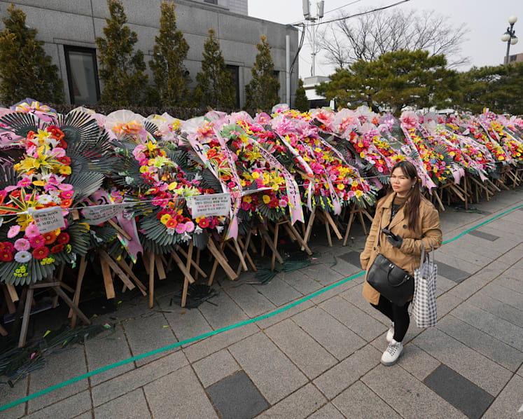 South Koreans turn funeral wreaths and K-pop light sticks into political protest tools