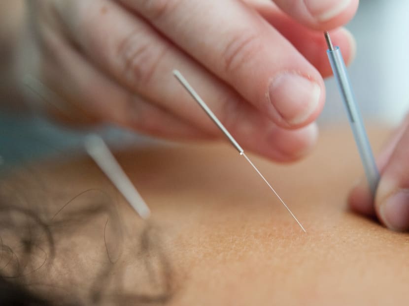 Before she was molested, a patient of Lim Ah Bah was unable to move because two to three cups were placed on the top part of her chest and some needles were placed on her stomach.