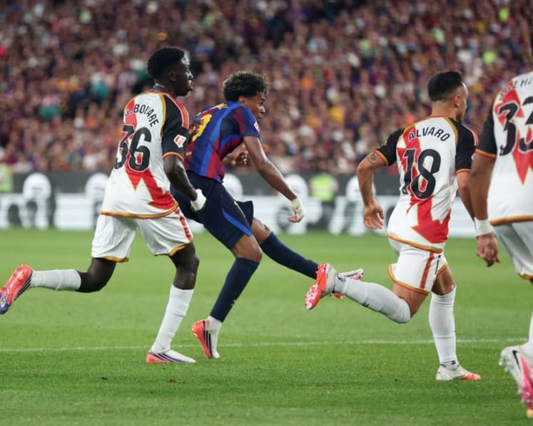 Raphinha and Lamine doubles lift Barcelona past Rayo Vallecano