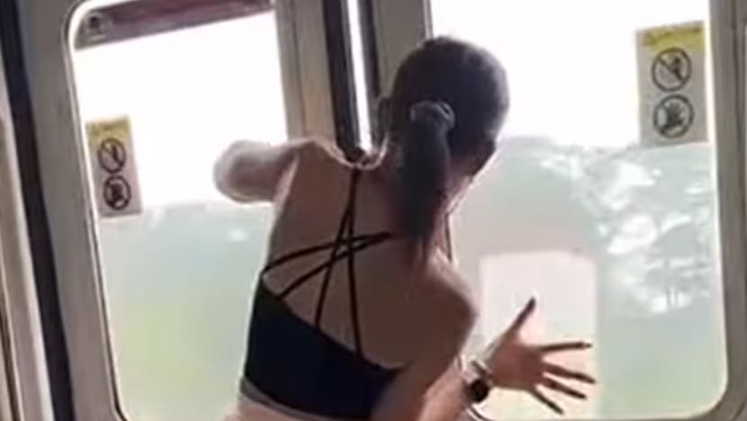 Man seen in viral video trying to force open MRT train doors charged with public nuisance Man seen in viral video trying to force open MRT train doors charged with public nuisance