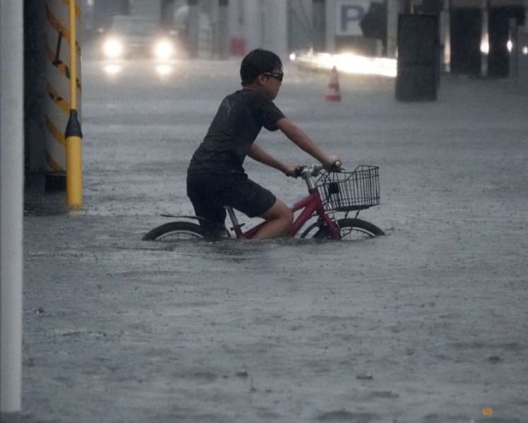 Flights scrapped, evacuations urged as Typhoon Dujuan wallops Japan