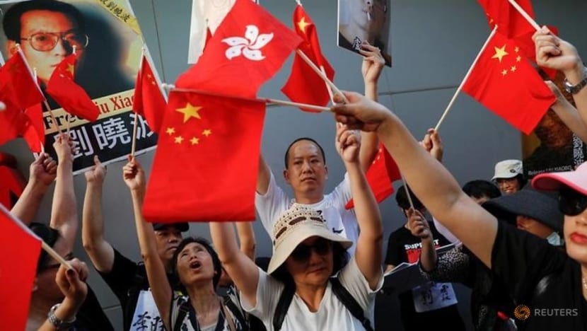 Commentary: 20 years later, Hong Kong an embattled one city, two people Commentary: 20 years later, Hong Kong an embattled one city, two people