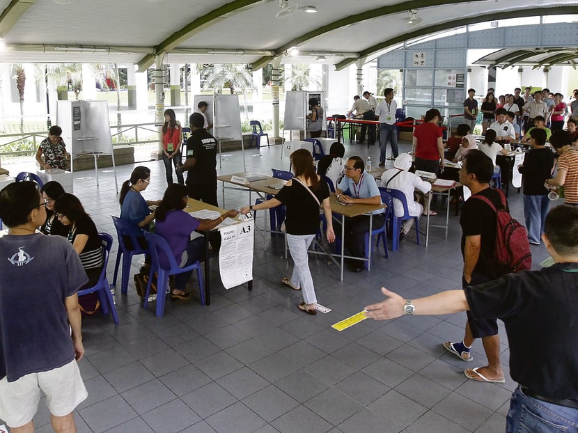 Voters casting their votes. TODAY file photo