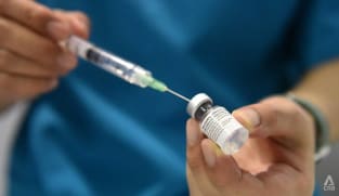 Singapore sees rise in COVID-19 cases as authorities say 'periodic' waves are expected