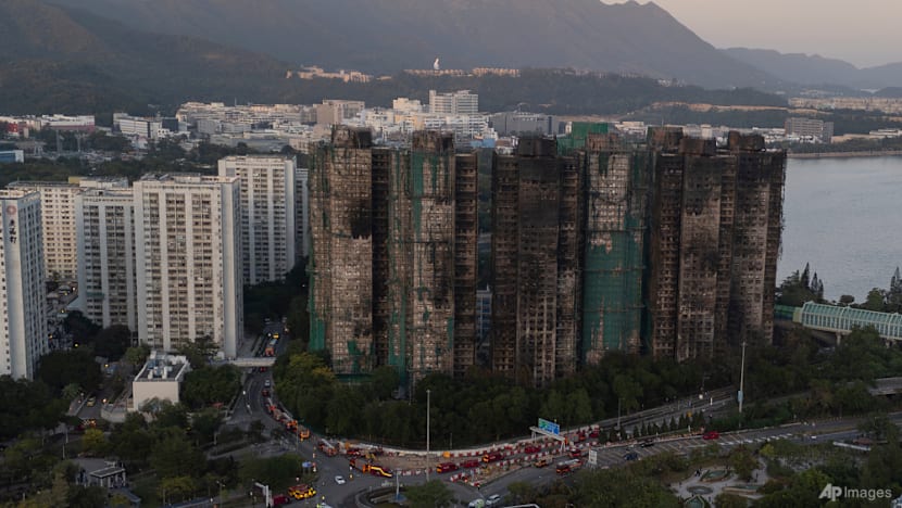 Hong Kong police arrest man for posts about deadly fire