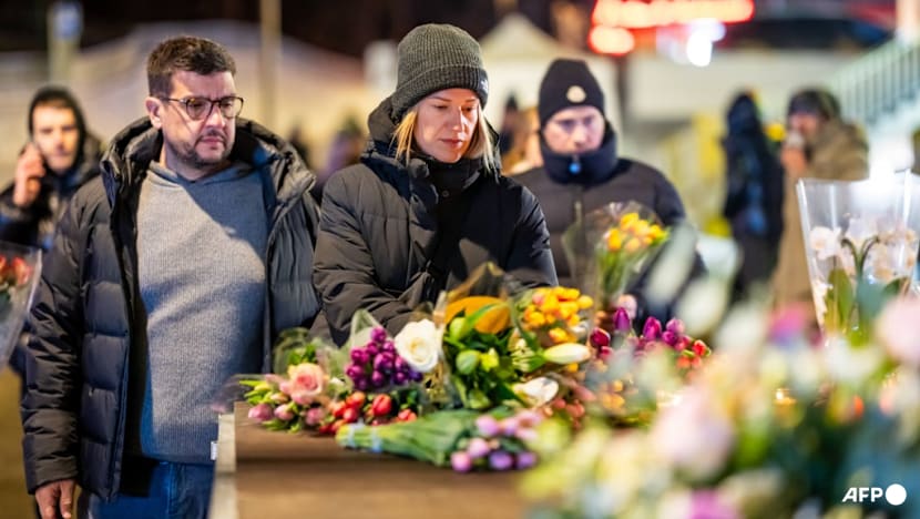 Tears and stunned silence at vigil for Swiss fire victims