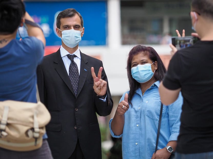 Ms Parti Liyani (right) and her lawyer Anil Balchandani (left) outside the State Courts on Sept 8, 2020.