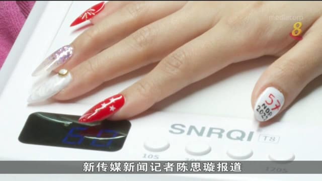 一些商家推出国庆日主题商品 反应不俗
