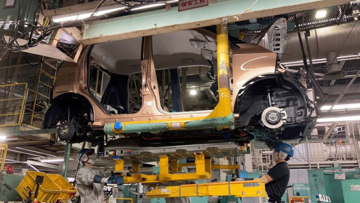 Japan's factory activity shrinks on tariff woes, services perk up, PMI shows