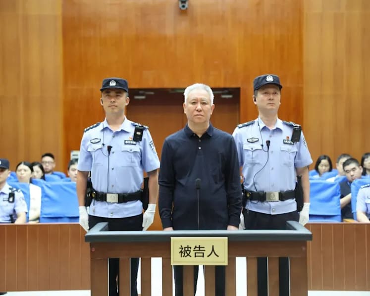 China jails Evergrande founder for life, fines firm more than US$2 billion