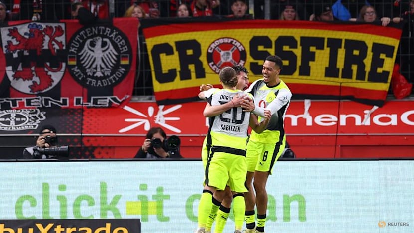 Dortmund survive late pressure to edge Leverkusen 2-1