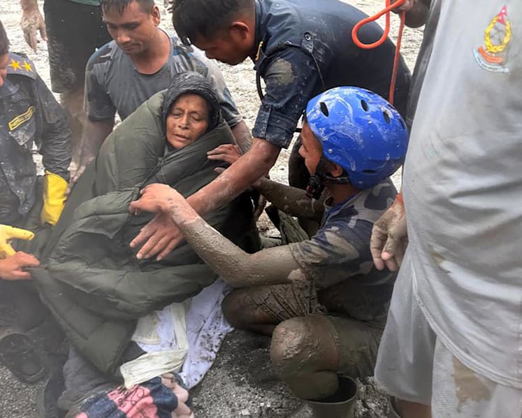 Nepali woman rescued alive from buried home 10 days after flood