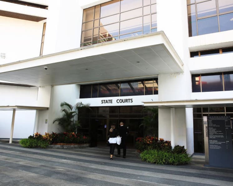 MD of horse-racing company gets jail, caning for molesting two women in Boat Quay bars