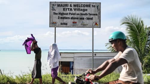 Migration with dignity? Kiribati swaps escape to purchased Fiji plot for sea walls to save their land