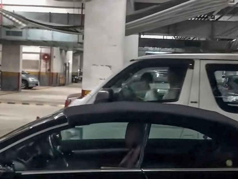 An online video shows a child steering a light goods vehicle in a car park while sitting on the driver’s lap. An online video shows a child steering a light goods vehicle in a car park while sitting on the driver’s lap.