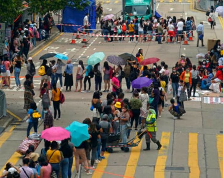 Hong Kong faces domestic worker shortage in push for COVID-zero