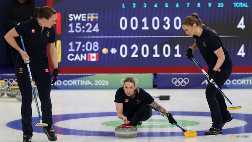 Curling-Hasselborg's Sweden lose to Canada but progress to semi-finals