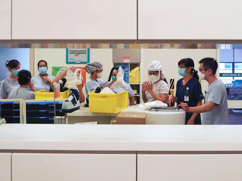 The Big Read in short: Blood, sweat, tears of Singapore’s frontline heroes against Covid-19